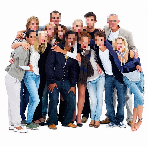 Group of people on white background where all faces have been automatically pixelated.